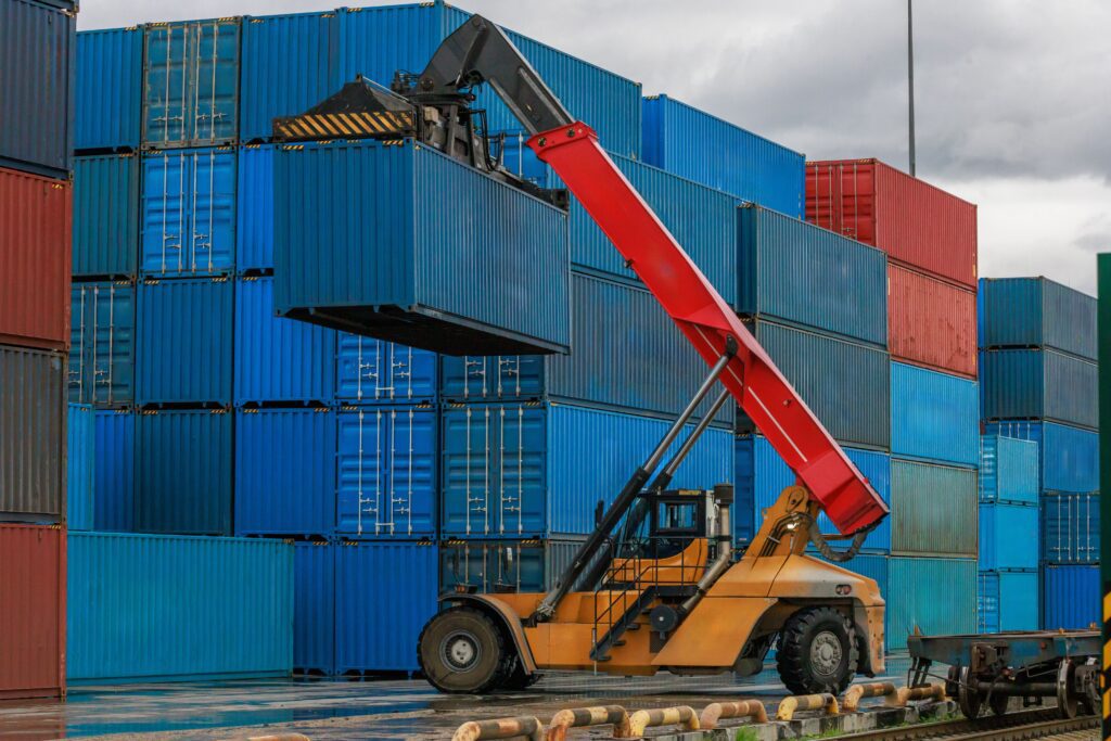 Link Resources licence to operate a reach stacker training reach stacker lifting shipping container at container terminal