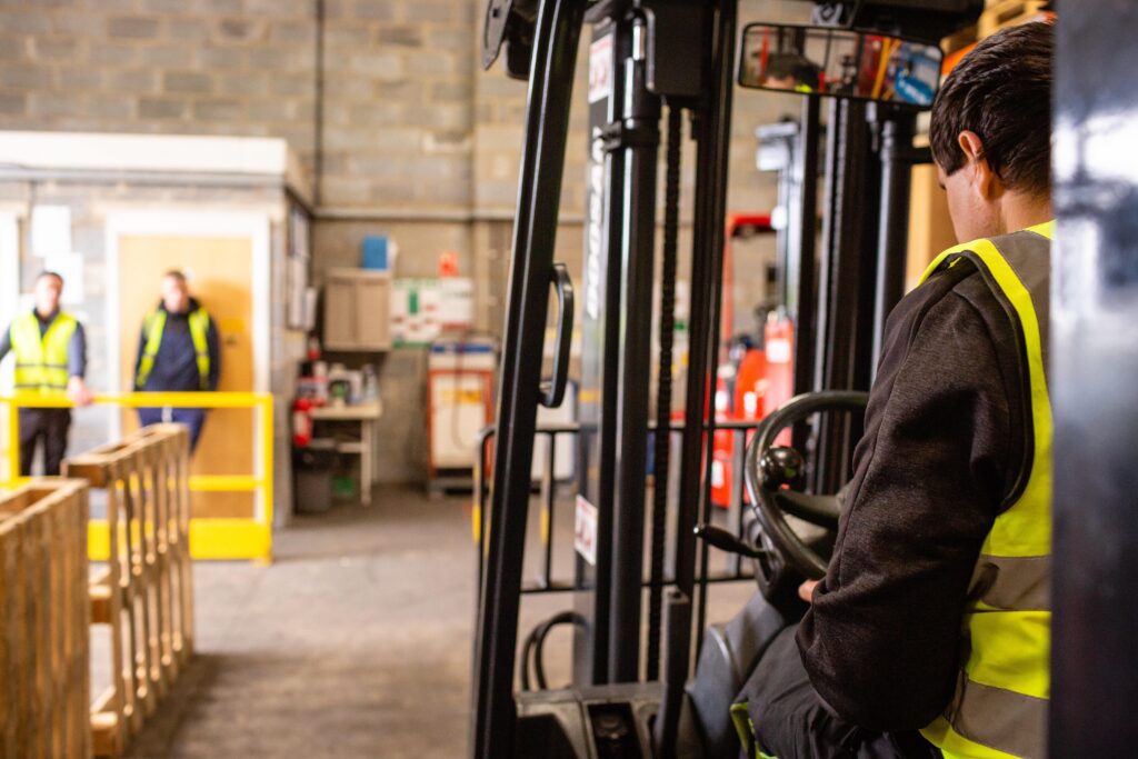 Link Resources forklift licence training operator driving forklift inside industrial facility