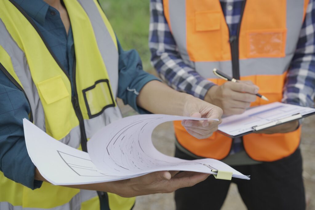 Close up of a safety certificate being finalized with an official stamp during a Link Resources permit course.
