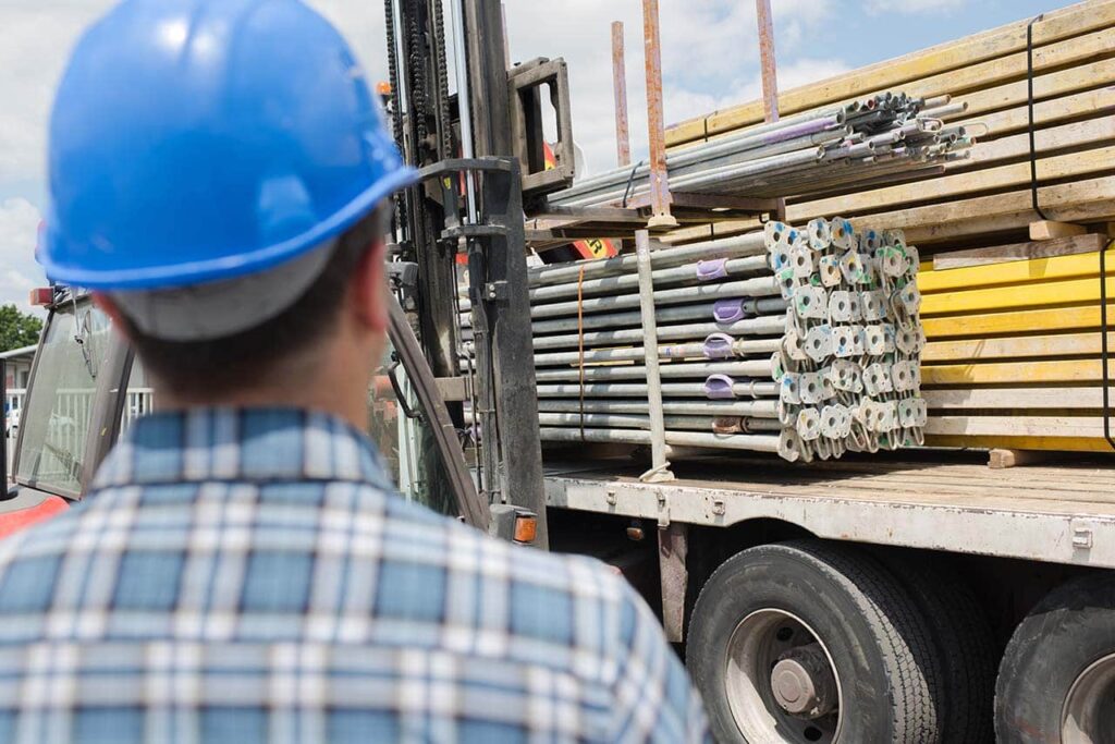 Link Resources load and unload course worker supervising forklift loading materials onto truck