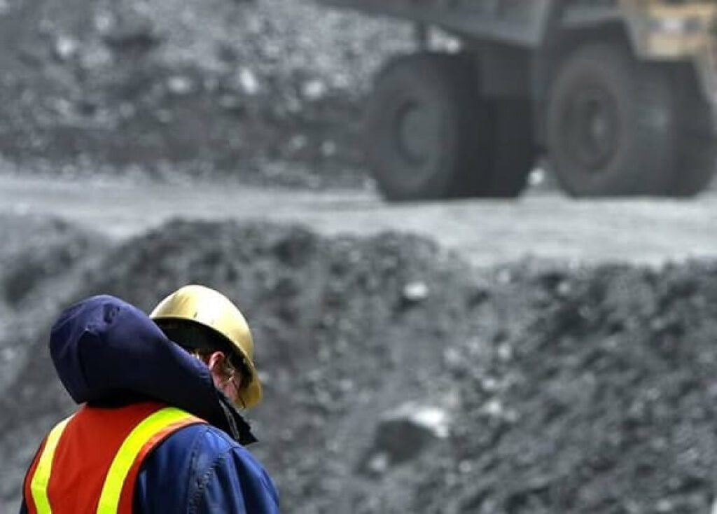 Link Resources mining site safety supervisor MSS S123 G189 worker monitoring heavy equipment on mine site