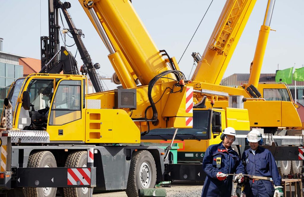 Link Resources dogging licence course workers inspecting mobile crane lifting equipment